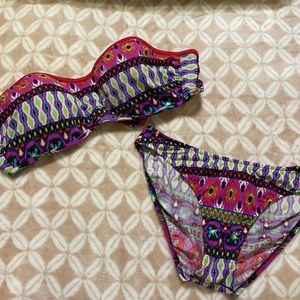 Strapless underwire swimsuit top and bottoms.